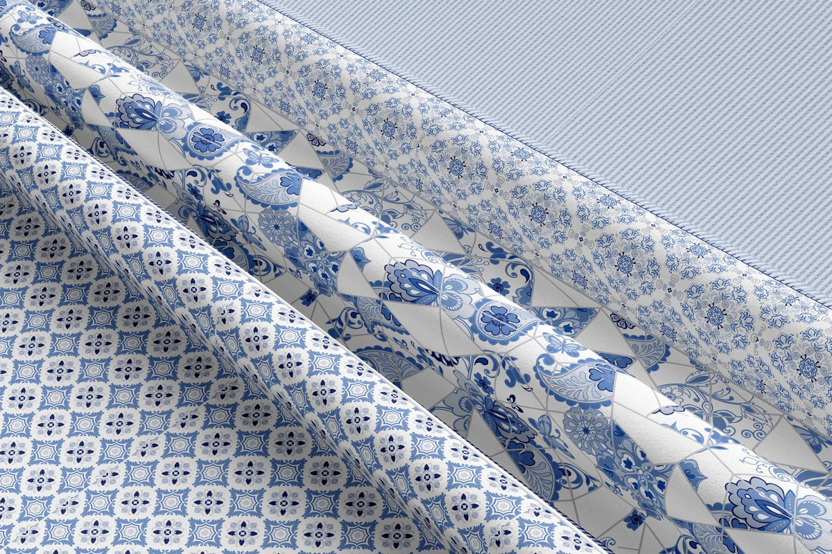 <img src="3.jpg" alt="Detailansicht der Renforce Bettwäsche mit verschiedenen Paisley und geometrischen Mustern in Blau und Weiß">